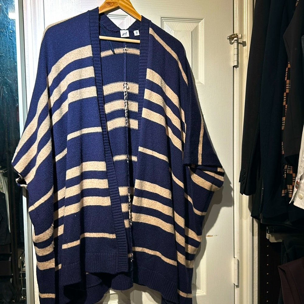 Blue and gold one size poncho!   No tags but worn only twice!  Made by Gap!